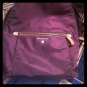 Michael Kors burgundy backpack